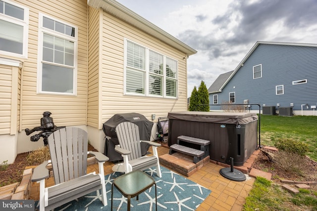 13115 Muirfield Ln, Berlin, MD 21811 - view of patio with cooling unit, a grill, and a hot tub
