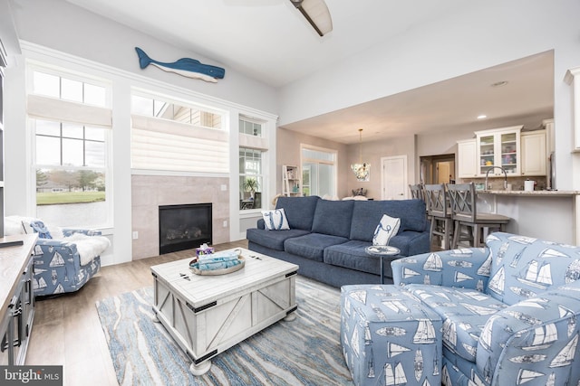 13115 Muirfield Ln, Berlin, MD 21811 - living area featuring wood finished floors, recessed lighting, and a tile fireplace