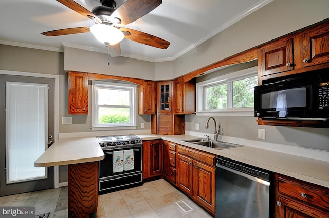 kitchen featuring a sink, visible vents, brown cabinets, light countertops, and black appliances