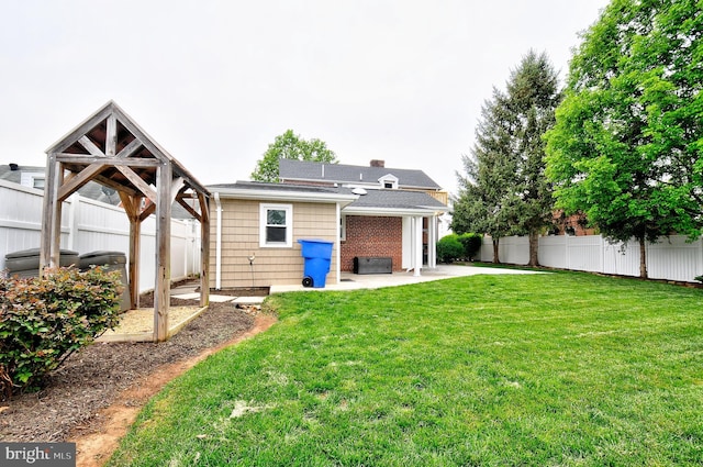 exterior space with fence and a patio area