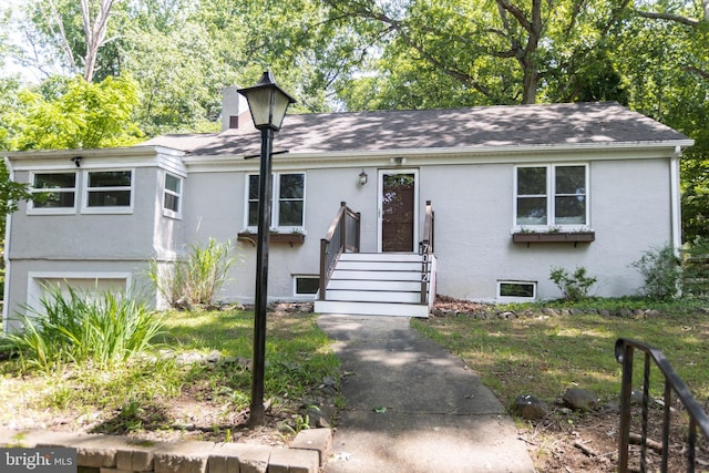 7012 Lancaster Rd, Baltimore, MD 21207 - view of front of property featuring stucco siding and roof with shingles