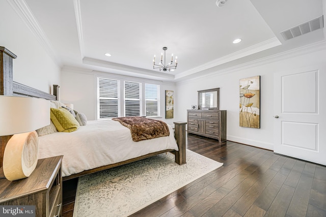 24642 Black Willow Dr, Aldie, VA 20105 - bedroom with an inviting chandelier, crown molding, visible vents, a tray ceiling, and dark wood finished floors
