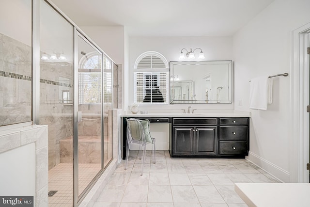 24642 Black Willow Dr, Aldie, VA 20105 - bathroom featuring a shower stall, vanity, and baseboards