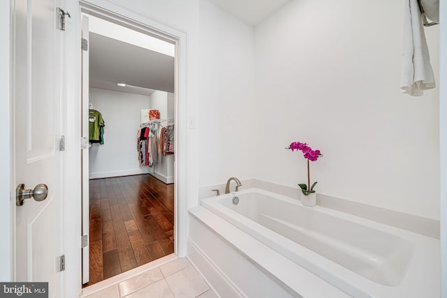 24642 Black Willow Dr, Aldie, VA 20105 - bathroom with tile patterned floors and a garden tub