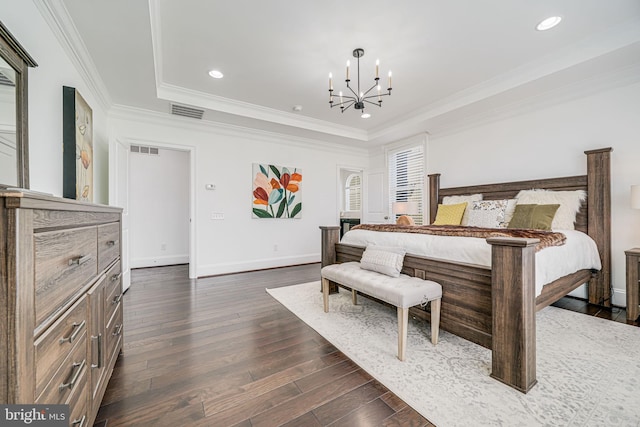 24642 Black Willow Dr, Aldie, VA 20105 - bedroom featuring a chandelier, dark wood-style floors, crown molding, visible vents, and a tray ceiling