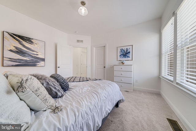 24642 Black Willow Dr, Aldie, VA 20105 - bedroom with visible vents, light colored carpet, and baseboards
