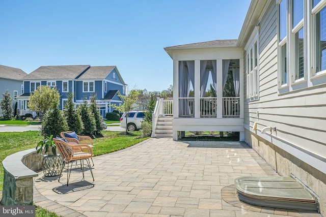 24642 Black Willow Dr, Aldie, VA 20105 - view of patio featuring a sunroom