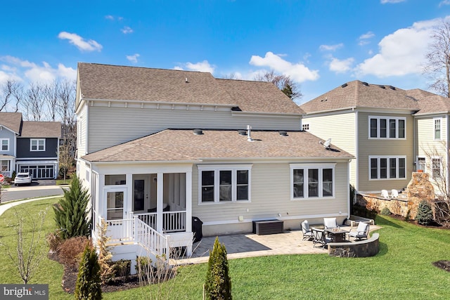 24642 Black Willow Dr, Aldie, VA 20105 - rear view of house with a lawn, a patio, a sunroom, and roof with shingles