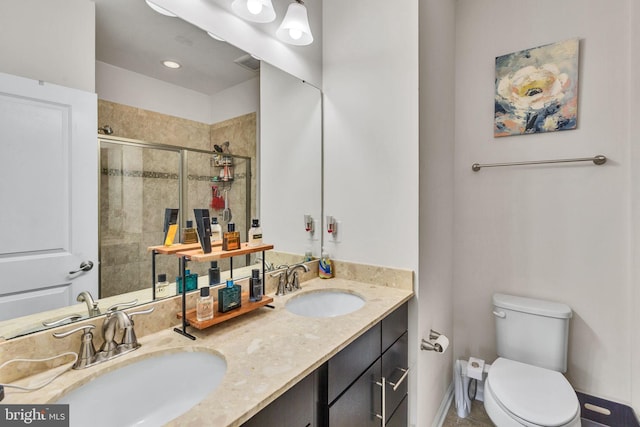 521 White Oak Dr, Glen Burnie, MD 21060 - bathroom featuring a stall shower, a sink, double vanity, and toilet