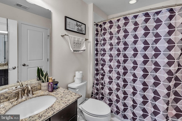 521 White Oak Dr, Glen Burnie, MD 21060 - bathroom with vanity, visible vents, recessed lighting, toilet, and curtained shower