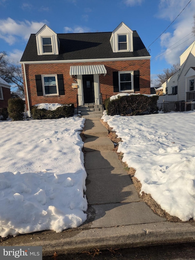 view of front of property featuring brick siding