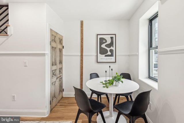 1129 E Berks St, Philadelphia, PA 19125 - dining space featuring baseboards and light wood-style floors