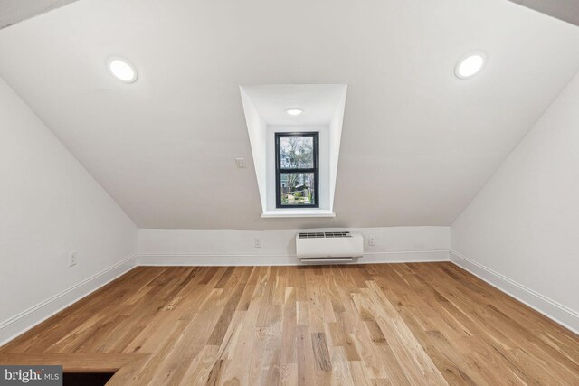 1129 E Berks St, Philadelphia, PA 19125 - bonus room featuring baseboards, light wood-style floors, and vaulted ceiling