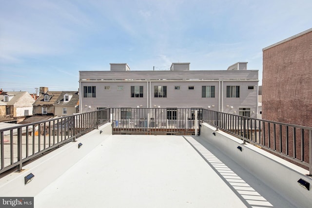 1129 E Berks St, Philadelphia, PA 19125 - rear view of property featuring a balcony and a chimney
