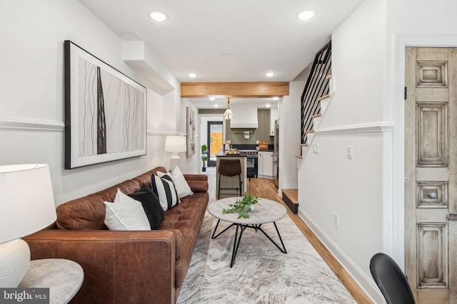 1129 E Berks St, Philadelphia, PA 19125 - living room featuring baseboards, recessed lighting, light wood-style flooring, and stairway