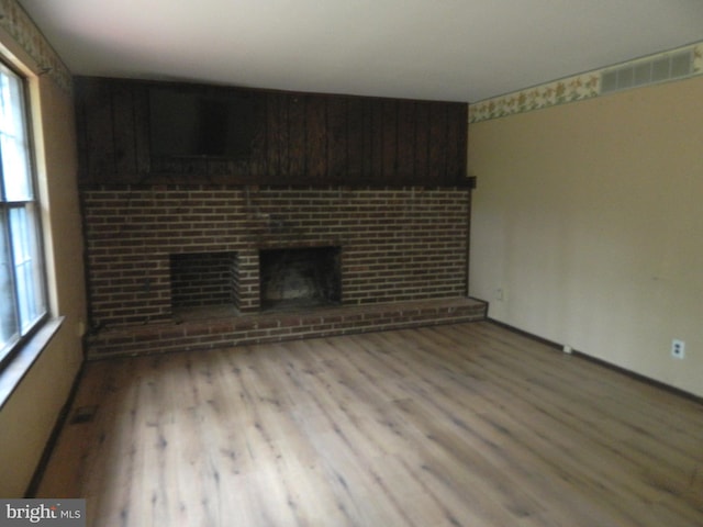 134 Country Ln, Sicklerville, NJ 08081 - unfurnished living room with wood finished floors and a fireplace