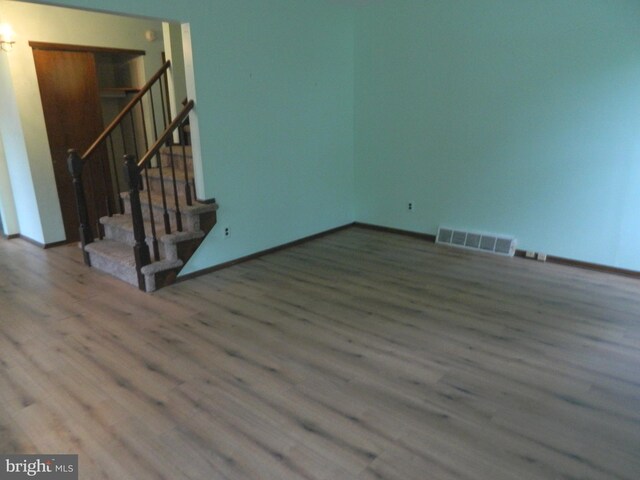 134 Country Ln, Sicklerville, NJ 08081 - spare room featuring wood finished floors, stairs, and baseboards
