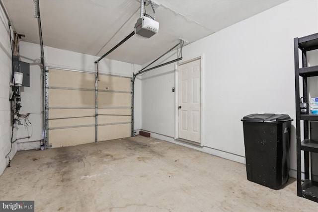 garage featuring a garage door opener