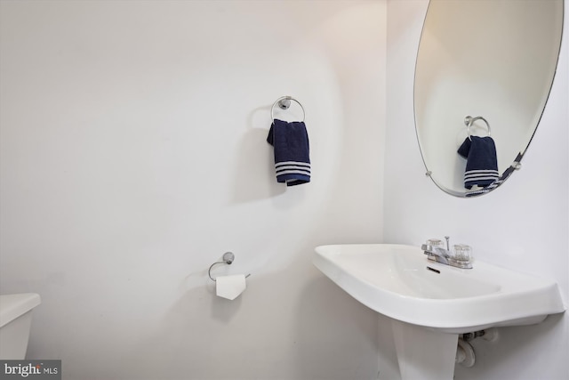 half bathroom with toilet