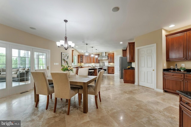 18102 Eaglesham Ct, Leesburg, VA 20175 - dining space featuring a chandelier, recessed lighting, and baseboards