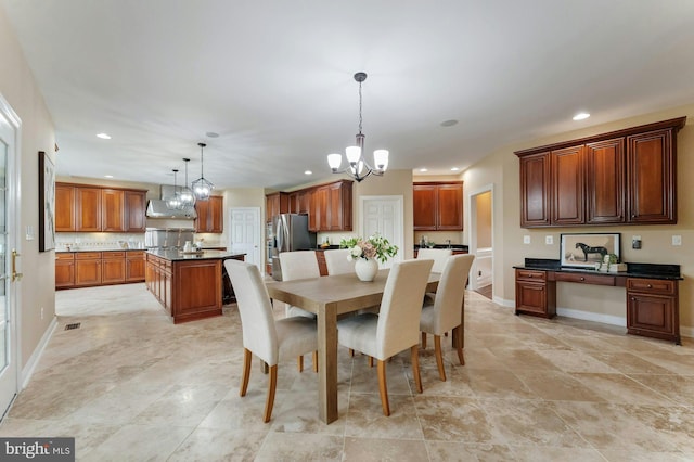18102 Eaglesham Ct, Leesburg, VA 20175 - dining area with a chandelier, recessed lighting, and baseboards