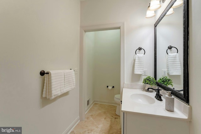 18102 Eaglesham Ct, Leesburg, VA 20175 - bathroom featuring toilet, vanity, and baseboards