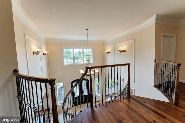 18102 Eaglesham Ct, Leesburg, VA 20175 - stairway featuring a chandelier, wood finished floors, and ornamental molding