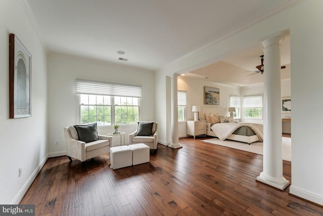 18102 Eaglesham Ct, Leesburg, VA 20175 - living area featuring decorative columns, ornamental molding, and dark wood-style floors