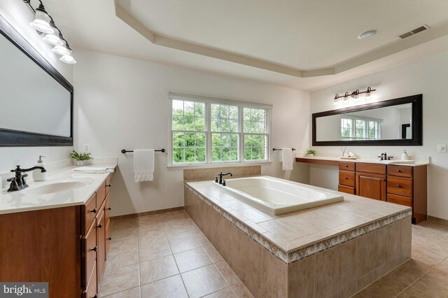 18102 Eaglesham Ct, Leesburg, VA 20175 - full bathroom with a tray ceiling, tile patterned floors, and baseboards