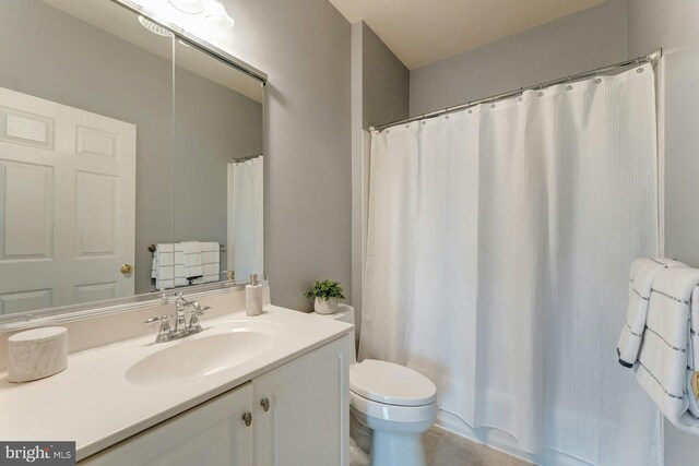 18102 Eaglesham Ct, Leesburg, VA 20175 - bathroom with toilet, vanity, tile patterned floors, and curtained shower