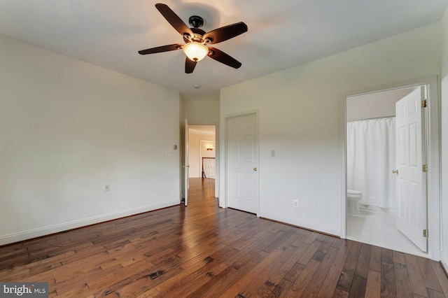 18102 Eaglesham Ct, Leesburg, VA 20175 - unfurnished bedroom featuring dark wood finished floors, baseboards, connected bathroom, and a ceiling fan