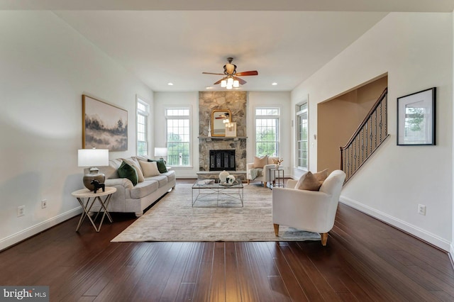 18102 Eaglesham Ct, Leesburg, VA 20175 - living area with dark wood-style flooring, a ceiling fan, baseboards, a fireplace, and recessed lighting