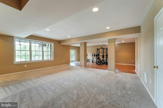 18102 Eaglesham Ct, Leesburg, VA 20175 - unfurnished living room with carpet flooring, baseboards, and recessed lighting