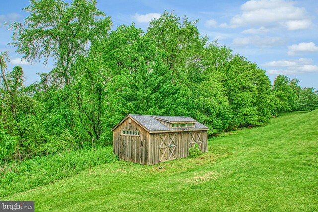 18102 Eaglesham Ct, Leesburg, VA 20175 - view of shed with a view of trees