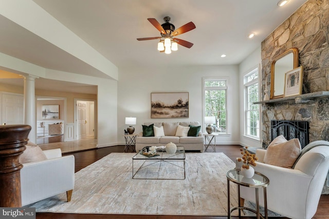 18102 Eaglesham Ct, Leesburg, VA 20175 - living room with dark wood-style floors, a fireplace, a ceiling fan, baseboards, and recessed lighting