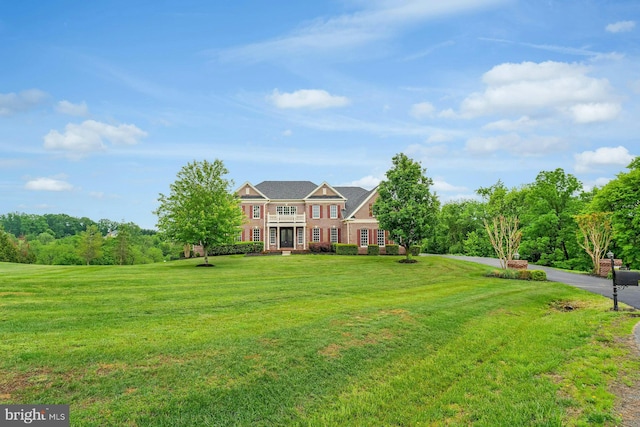 18102 Eaglesham Ct, Leesburg, VA 20175 - georgian-style home featuring a front lawn and brick siding