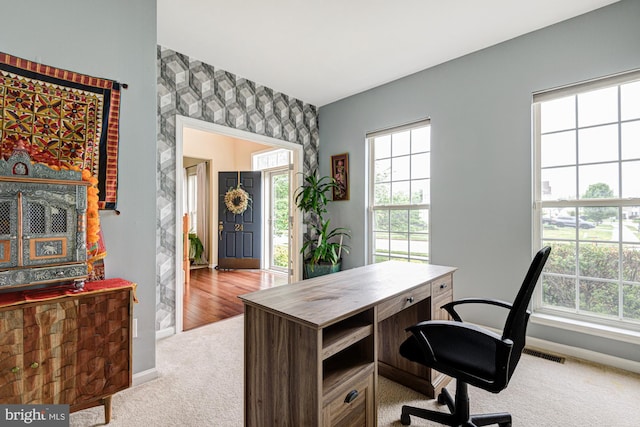 24 W Shakespeare Dr, Middletown, DE 19709 - carpeted office with wallpapered walls, baseboards, an accent wall, and bar area