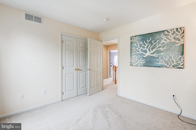 24 W Shakespeare Dr, Middletown, DE 19709 - unfurnished bedroom with carpet floors, baseboards, and a closet