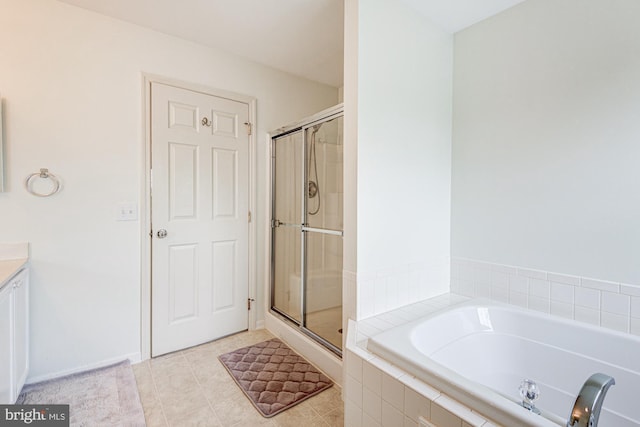 24 W Shakespeare Dr, Middletown, DE 19709 - full bath with a stall shower, a garden tub, tile patterned flooring, and vanity