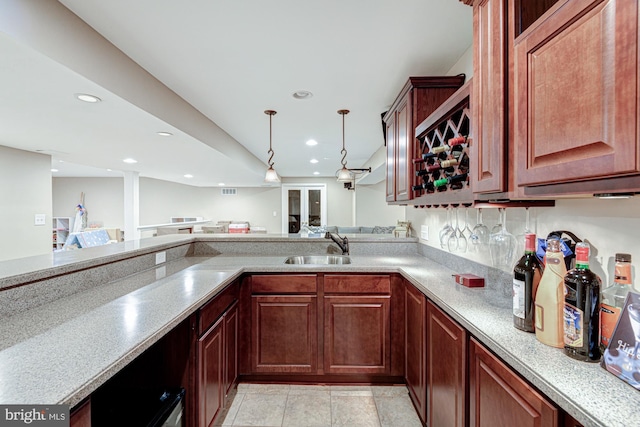 24 W Shakespeare Dr, Middletown, DE 19709 - kitchen with a sink, light countertops, pendant lighting, recessed lighting, and open floor plan