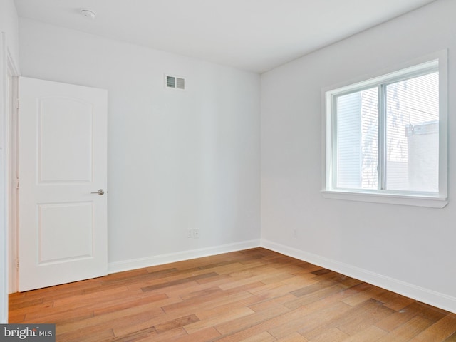 2671 Emerald St, Philadelphia, PA 19125 - spare room featuring baseboards, light wood finished floors, and visible vents