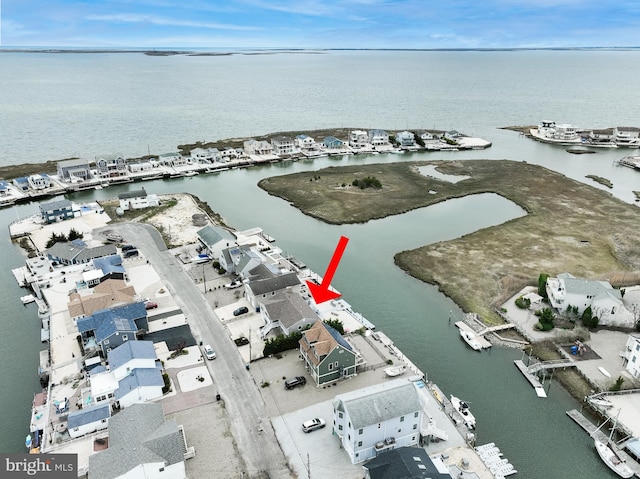 drone / aerial view featuring a water view