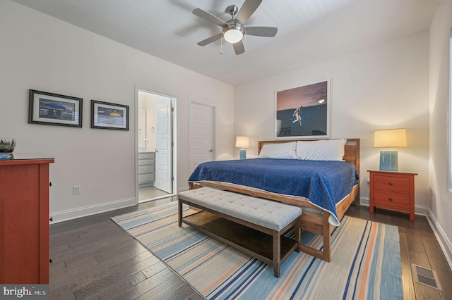 bedroom featuring wood-type flooring, ensuite bath, baseboards, visible vents, and ceiling fan