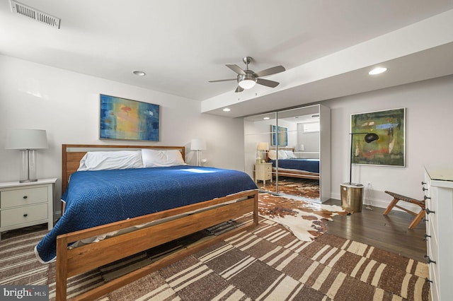 bedroom featuring recessed lighting, baseboards, visible vents, a ceiling fan, and wood finished floors