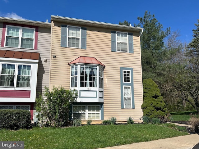 458 Silver Ct, Westminster, MD 21158 - view of front of property featuring a standing seam roof, metal roof, and a front lawn