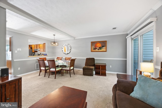 458 Silver Ct, Westminster, MD 21158 - carpeted living area with ornamental molding, healthy amount of natural light, baseboards, beam ceiling, and a chandelier