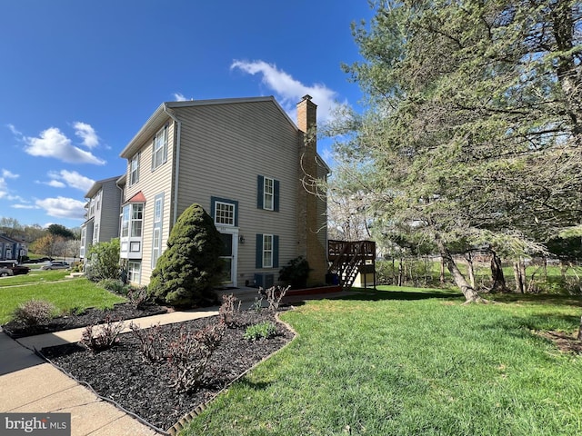 458 Silver Ct, Westminster, MD 21158 - view of side of home featuring a chimney, a lawn, cooling unit, and a deck