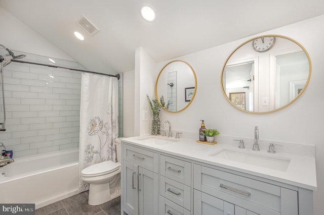 219 Hitching Post Dr, Bel Air, MD 21014 - full bathroom featuring double vanity, shower / tub combo, toilet, wood finished floors, and vaulted ceiling