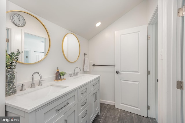 219 Hitching Post Dr, Bel Air, MD 21014 - full bath with double vanity, vaulted ceiling, recessed lighting, baseboards, and wood finished floors