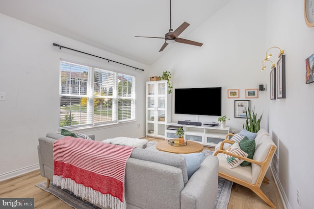 219 Hitching Post Dr, Bel Air, MD 21014 - living area with a ceiling fan, light wood-style floors, baseboards, and high vaulted ceiling